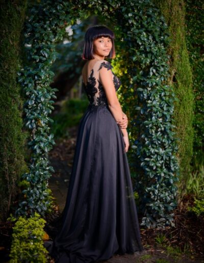 Lady in black matric gown